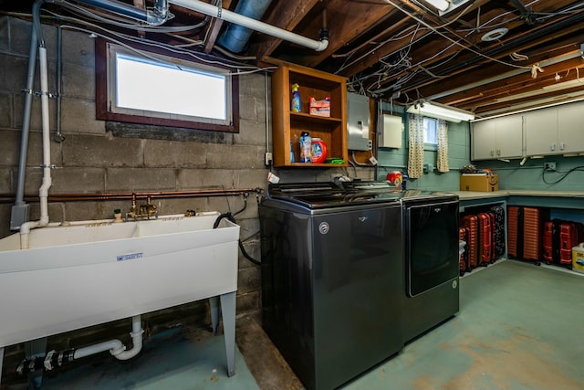 1373 Kingman Dr, Saint Joseph, MI 49085 - laundry area featuring independent washer and dryer and cabinet space