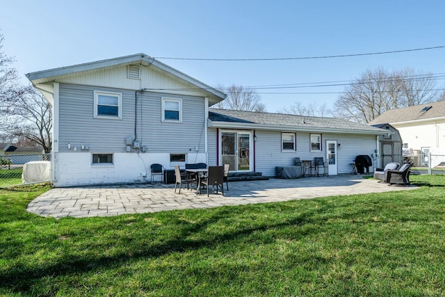 1373 Kingman Dr, Saint Joseph, MI 49085 - back of house with a patio, fence, and a yard