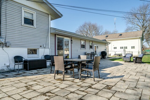 1373 Kingman Dr, Saint Joseph, MI 49085 - view of patio with fence and outdoor dining area
