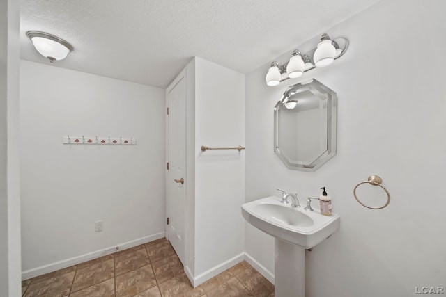3387 Round Lake Hwy, Manitou Beach, MI 49253 - bathroom featuring a textured ceiling