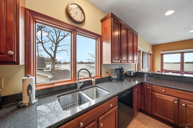 3387 Round Lake Hwy, Manitou Beach, MI 49253 - kitchen with black dishwasher, a water view, a textured ceiling, recessed lighting, and light tile patterned floors