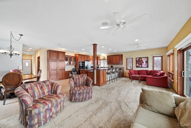 3387 Round Lake Hwy, Manitou Beach, MI 49253 - living room with recessed lighting, a ceiling fan, a chandelier, and light colored carpet