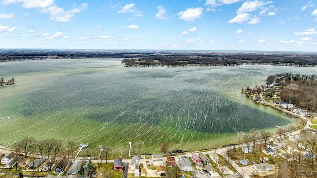 3387 Round Lake Hwy, Manitou Beach, MI 49253 - aerial overview of property's location with a nearby body of water and nearby suburban area