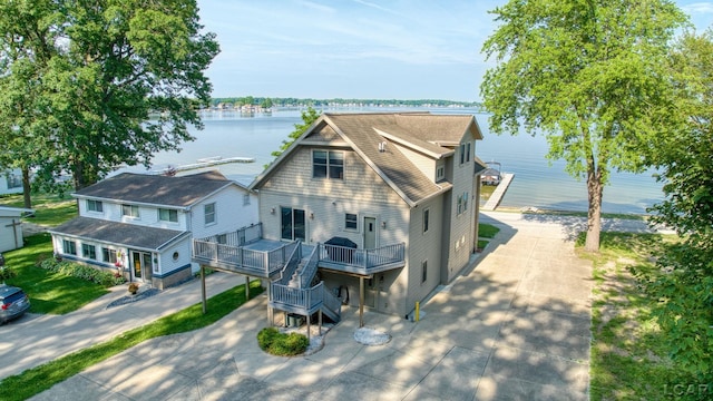 3387 Round Lake Hwy, Manitou Beach, MI 49253 - view of front of property featuring a deck with water view