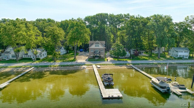 3387 Round Lake Hwy, Manitou Beach, MI 49253 - dock area featuring a water view and view of wooded area