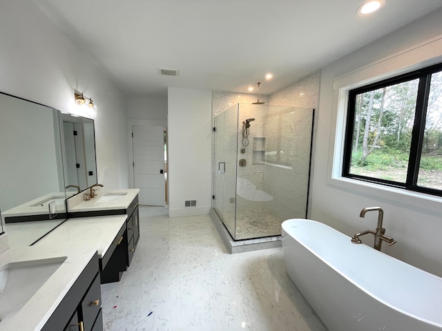 2323 Canterwood, Highland, MI 48357 - bathroom featuring double vanity, a sink, a soaking tub, visible vents, and a shower stall