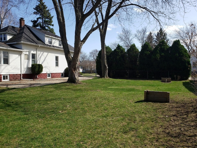 view of yard with fence