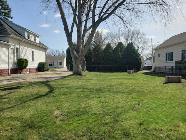 view of yard featuring fence