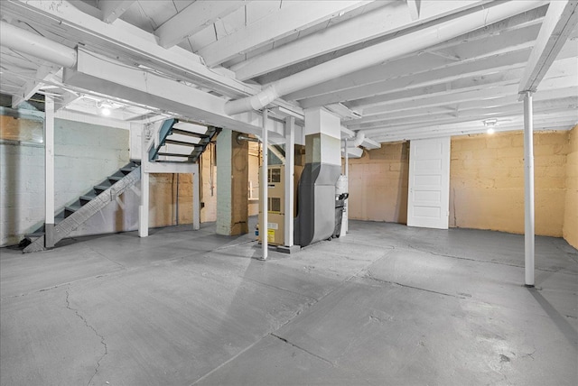 1026 S Jackson St, Jackson, MI 49203 - unfinished below grade area with stairway