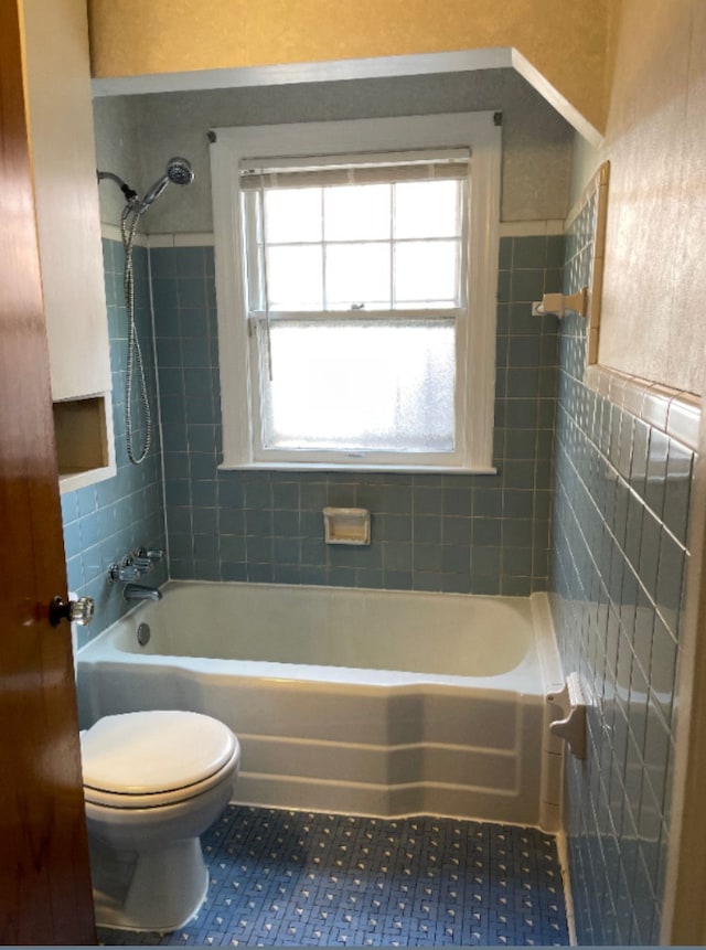 9327 Cloverlawn St, Detroit, MI 48204 - bathroom with toilet, tile patterned floors, and shower / washtub combination