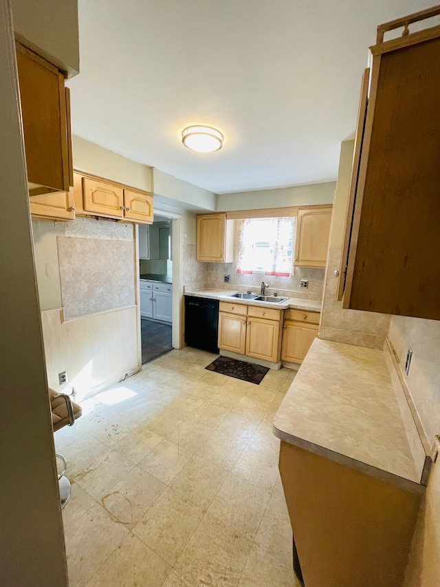 9327 Cloverlawn St, Detroit, MI 48204 - kitchen featuring tasteful backsplash, light brown cabinets, black dishwasher, light floors, and a sink