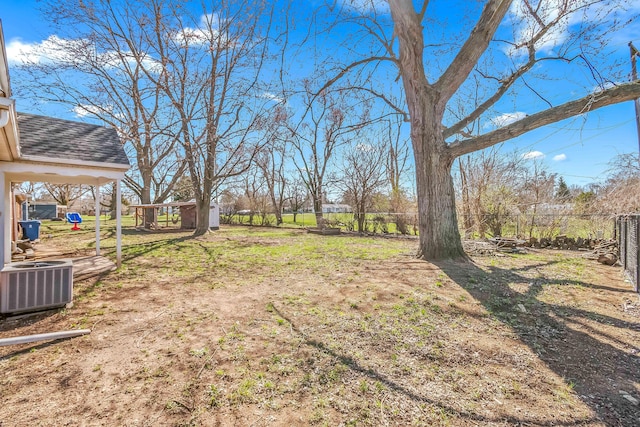 view of yard featuring a fenced backyard and cooling unit