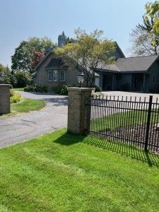 view of gate featuring fence