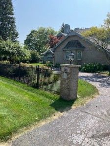 exterior space featuring a yard, aphalt driveway, and fence private yard