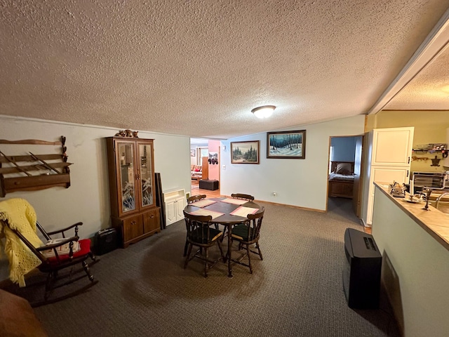 dining area with dark carpet, vaulted ceiling, and a textured ceiling