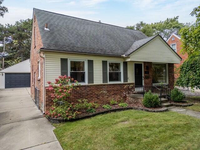 4423 Groveland Ave, Royal Oak, MI 48073 - view of front facade with a shingled roof, a garage, an outdoor structure, and brick siding