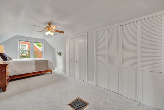 4423 Groveland Ave, Royal Oak, MI 48073 - bedroom with visible vents, a ceiling fan, carpet, multiple closets, and lofted ceiling