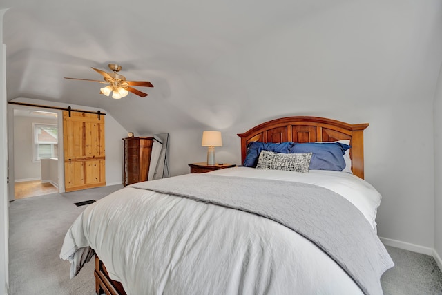 4423 Groveland Ave, Royal Oak, MI 48073 - carpeted bedroom with baseboards, ceiling fan, a barn door, and vaulted ceiling