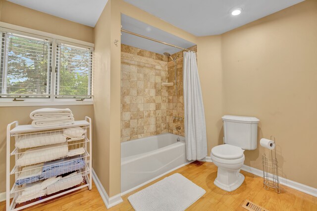 4423 Groveland Ave, Royal Oak, MI 48073 - bathroom featuring toilet, wood finished floors, and baseboards