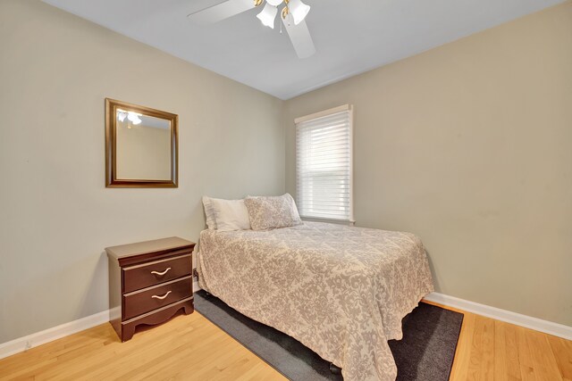 4423 Groveland Ave, Royal Oak, MI 48073 - bedroom with light wood-type flooring, baseboards, and a ceiling fan