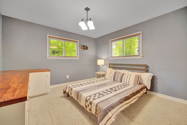 4423 Groveland Ave, Royal Oak, MI 48073 - bedroom featuring carpet flooring, baseboards, and multiple windows