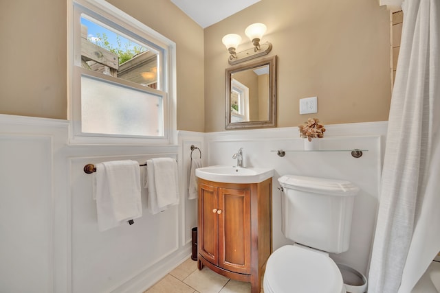 4423 Groveland Ave, Royal Oak, MI 48073 - bathroom with toilet, tile patterned floors, vanity, and a wainscoted wall
