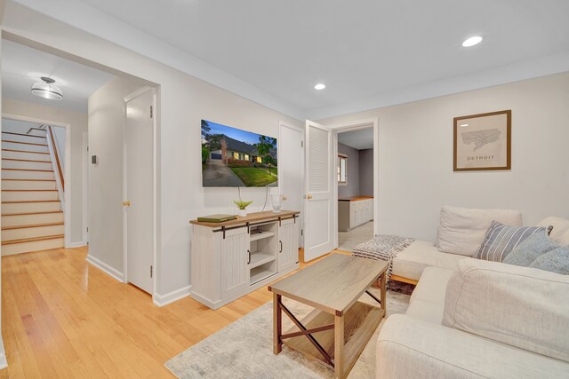 4423 Groveland Ave, Royal Oak, MI 48073 - living room featuring light wood-style floors, recessed lighting, baseboards, and stairway