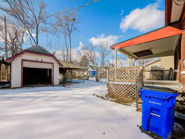 14011 Roselawn St, Detroit, MI 48238 - exterior space with an outbuilding and a detached garage