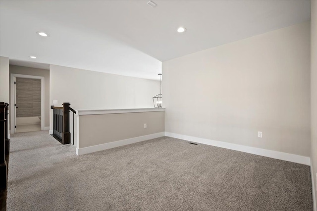 24599 Brookshire Dr, Macomb, MI 48042 - empty room featuring baseboards, light carpet, recessed lighting, and visible vents