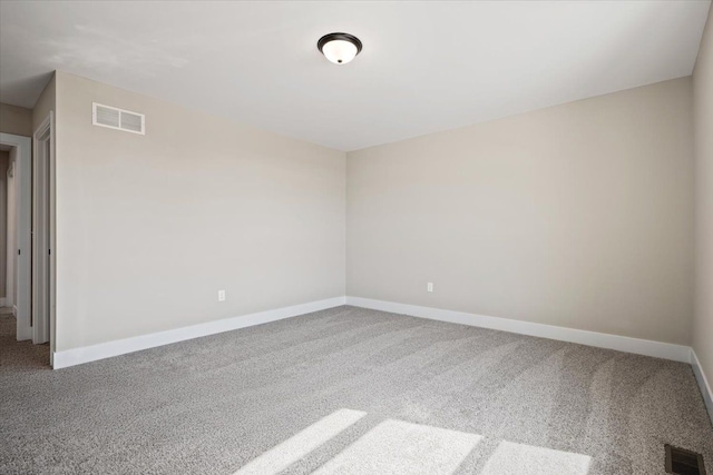 24599 Brookshire Dr, Macomb, MI 48042 - carpeted spare room featuring baseboards and visible vents