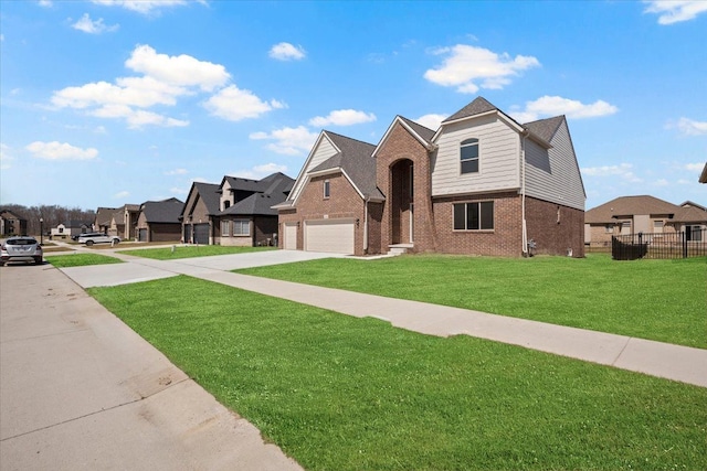 24599 Brookshire Dr, Macomb, MI 48042 - view of front facade featuring fence, a front yard, brick siding, driveway, and a residential view