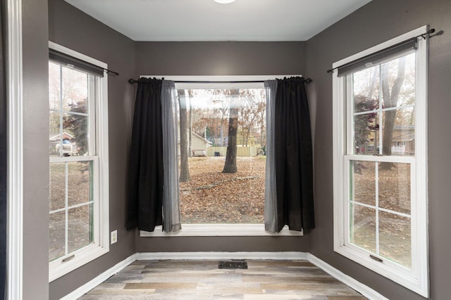 4725 Hickory Dr, Highland, MI 48356 - spare room with wood finished floors and baseboards