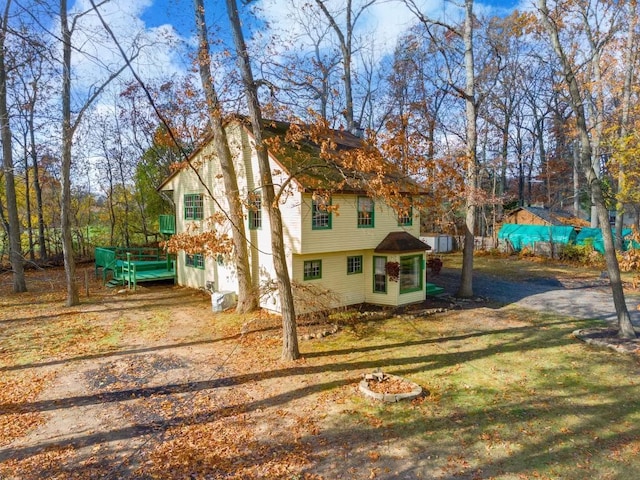 4725 Hickory Dr, Highland, MI 48356 - rear view of property
