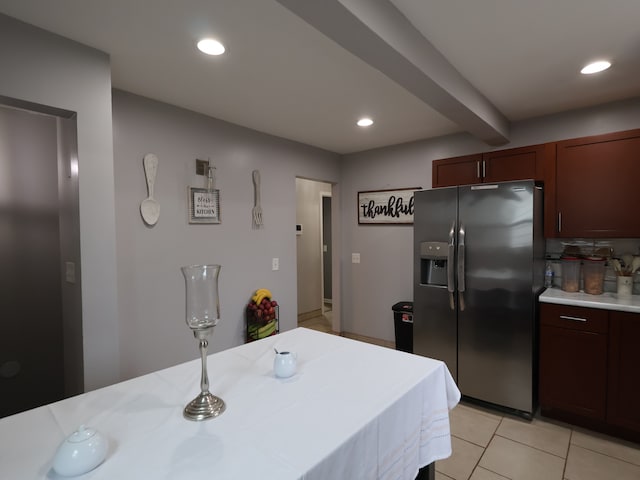 81 E Fairmount Ave, Pontiac, MI 48340 - kitchen featuring light countertops, recessed lighting, stainless steel refrigerator with ice dispenser, and light tile patterned flooring