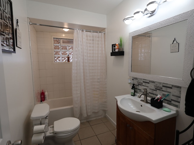 81 E Fairmount Ave, Pontiac, MI 48340 - full bath with vanity, toilet, shower / tub combo with curtain, tile patterned floors, and backsplash