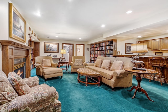 6242 131st St, Saugatuck, MI 49453 - living room with a glass covered fireplace, recessed lighting, and carpet
