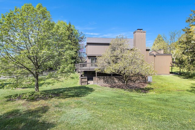 1 Northwick Ct, Ann Arbor, MI 48105 - view of green lawn featuring a wooden deck