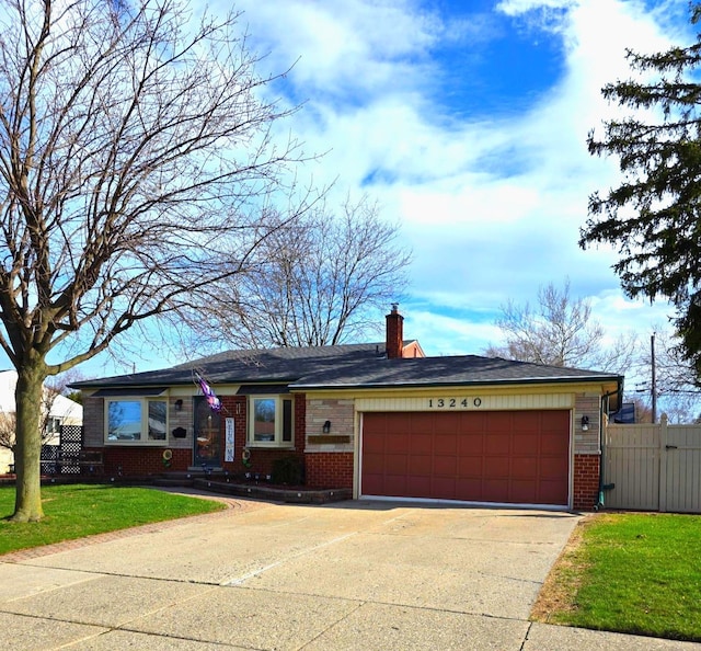 ranch-style home featuring driveway, fence, brick siding, an attached garage, and a front yard