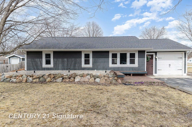 5024 Kencliff Dr, Saginaw, MI 48638 - ranch-style home with fence, an attached garage, and aphalt driveway