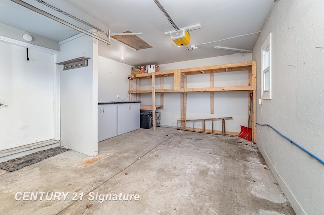 5024 Kencliff Dr, Saginaw, MI 48638 - garage featuring a garage door opener