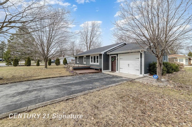 5024 Kencliff Dr, Saginaw, MI 48638 - ranch-style house featuring driveway, a wooden deck, and a garage
