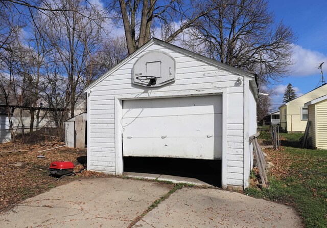 1406 Lincoln Ave, Flint, MI 48507 - detached garage featuring driveway