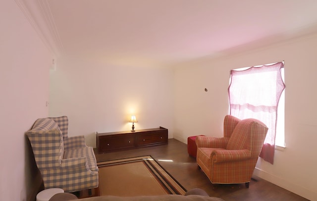 1406 Lincoln Ave, Flint, MI 48507 - living room featuring baseboards, ornamental molding, and wood finished floors