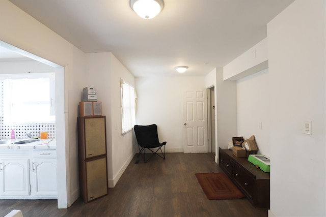 1406 Lincoln Ave, Flint, MI 48507 - corridor with baseboards and dark wood finished floors