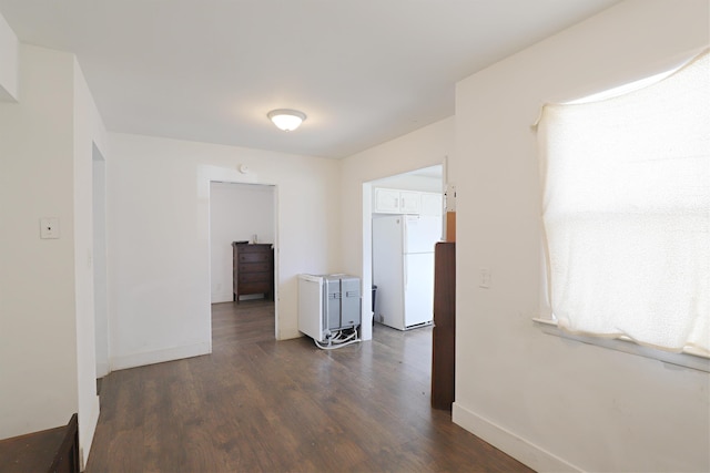 1406 Lincoln Ave, Flint, MI 48507 - corridor with baseboards and dark wood-style floors