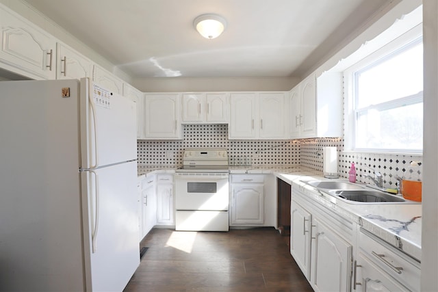 1406 Lincoln Ave, Flint, MI 48507 - kitchen featuring a sink, decorative backsplash, white appliances, and white cabinets