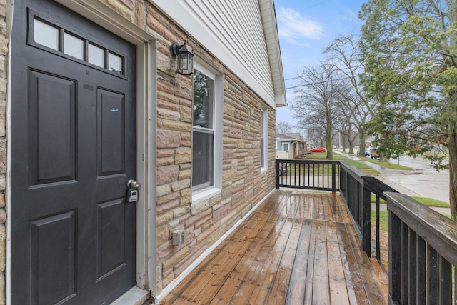 wooden terrace featuring a porch