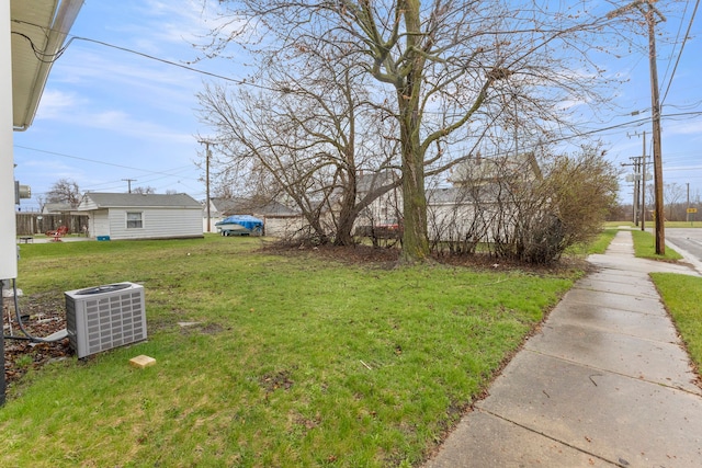 view of yard featuring central AC