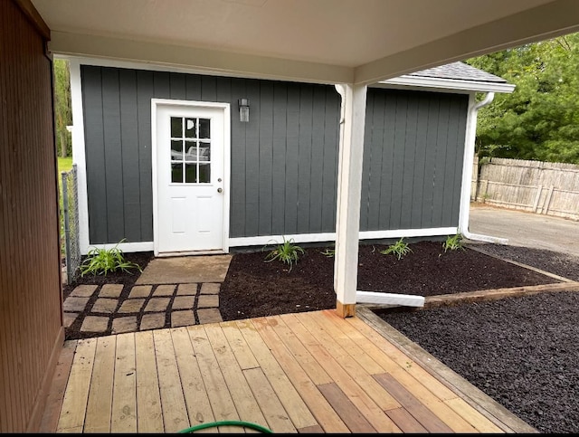 doorway to property with fence
