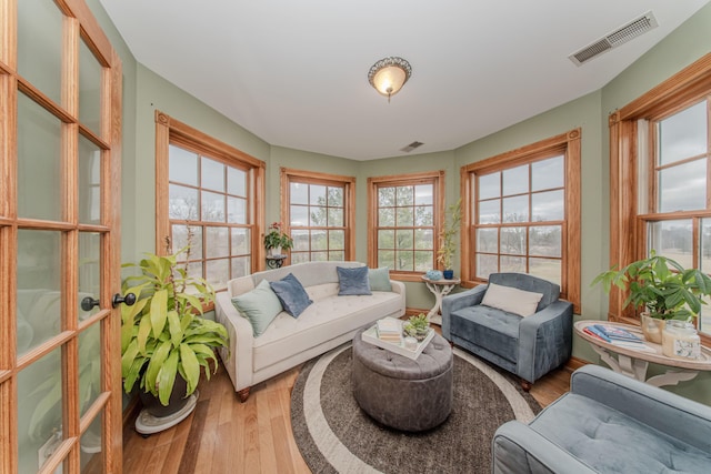 5050 Pleasant Lake Rd, Ann Arbor, MI 48103 - sunroom with wood finished floors and plenty of natural light